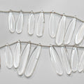 Perles plates lisses en cristal de roche de 20 cm (8 pouces), 37 x 9,5 à 22,7 x 8 mm, longueur 20 cm. Réf. 14995