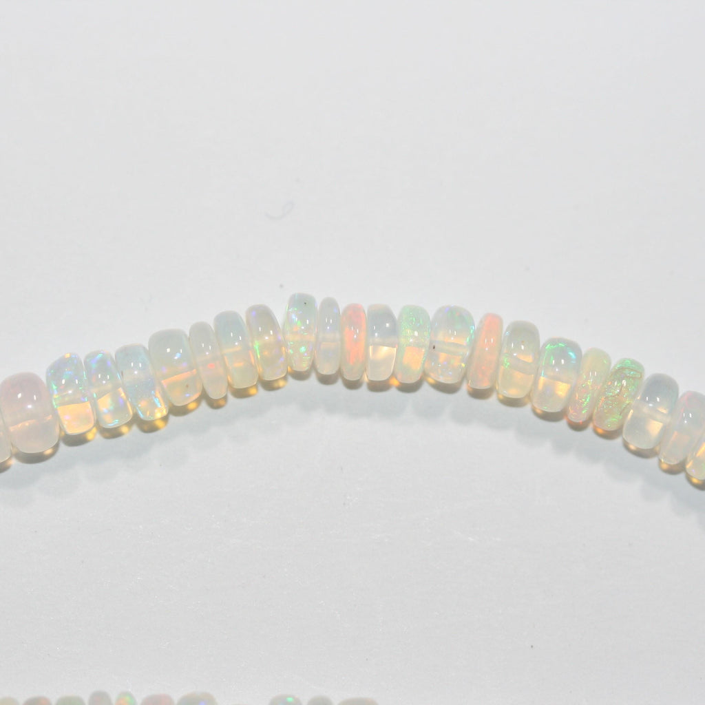 Cuentas redondas lisas de ópalo etíope de San Etiopía de 40 cm, 6 x 3 mm (aprox.). Hilo de 40 cm.