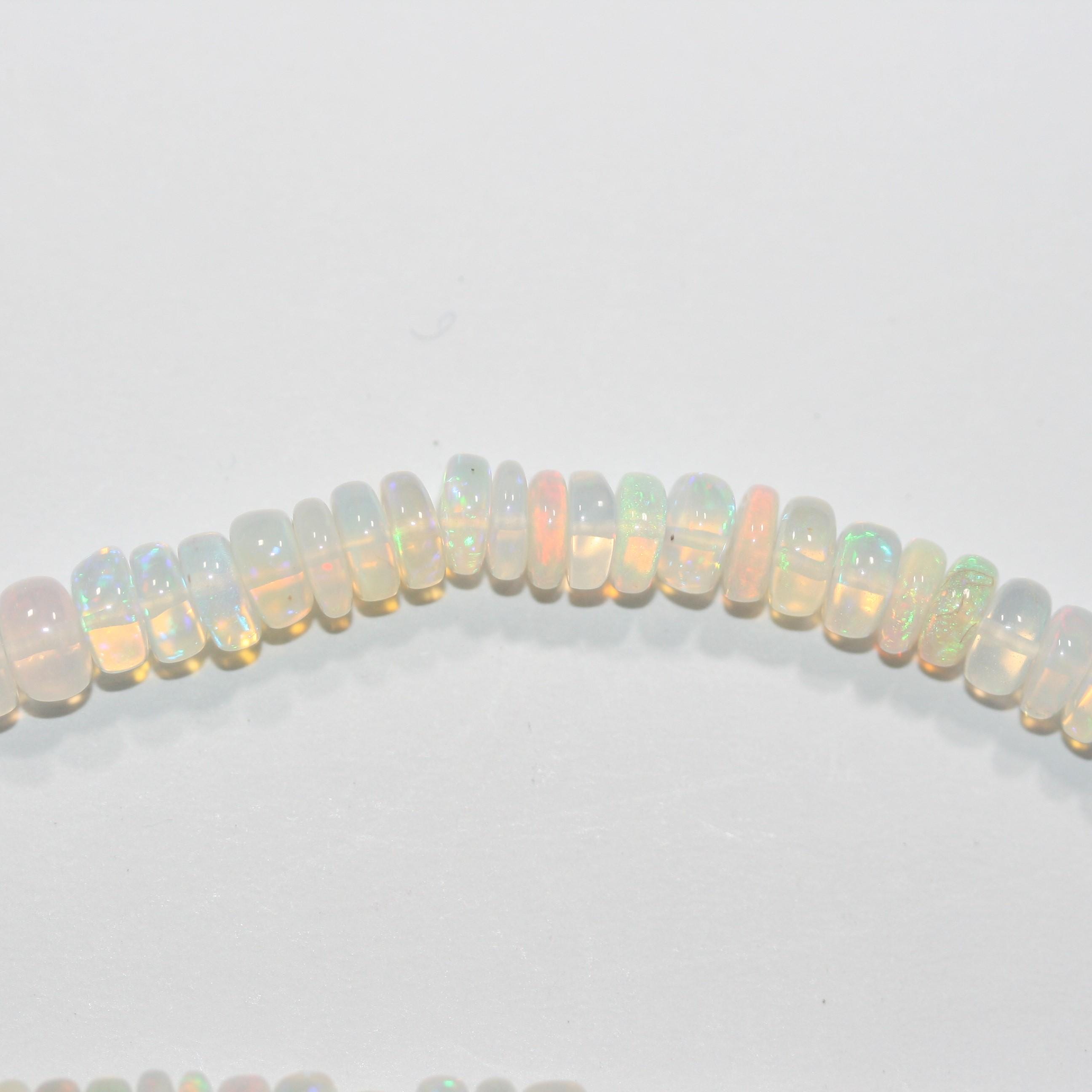 Cuentas redondas lisas de ópalo etíope de San Etiopía de 40 cm, 6 x 3 mm (aprox.). Hilo de 40 cm.