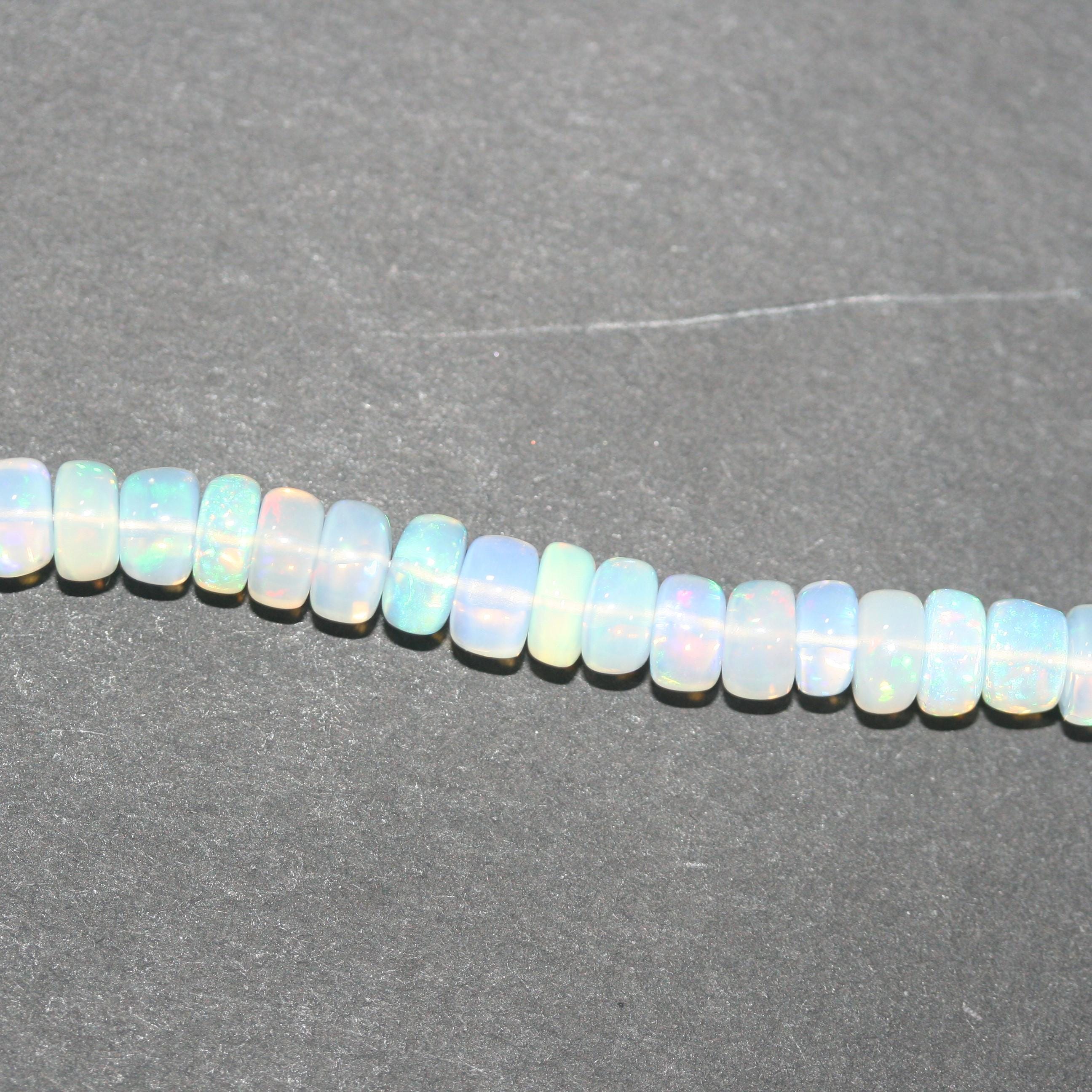 Cuentas redondas lisas de ópalo etíope de San Etiopía de 40 cm, 6 x 3 mm (aprox.). Hilo de 40 cm.