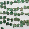Cuentas planas ovaladas irregulares de esmeralda de 8" (6-8 mm). Aprox. - Hilo de 20 cm. - Artículo 15000