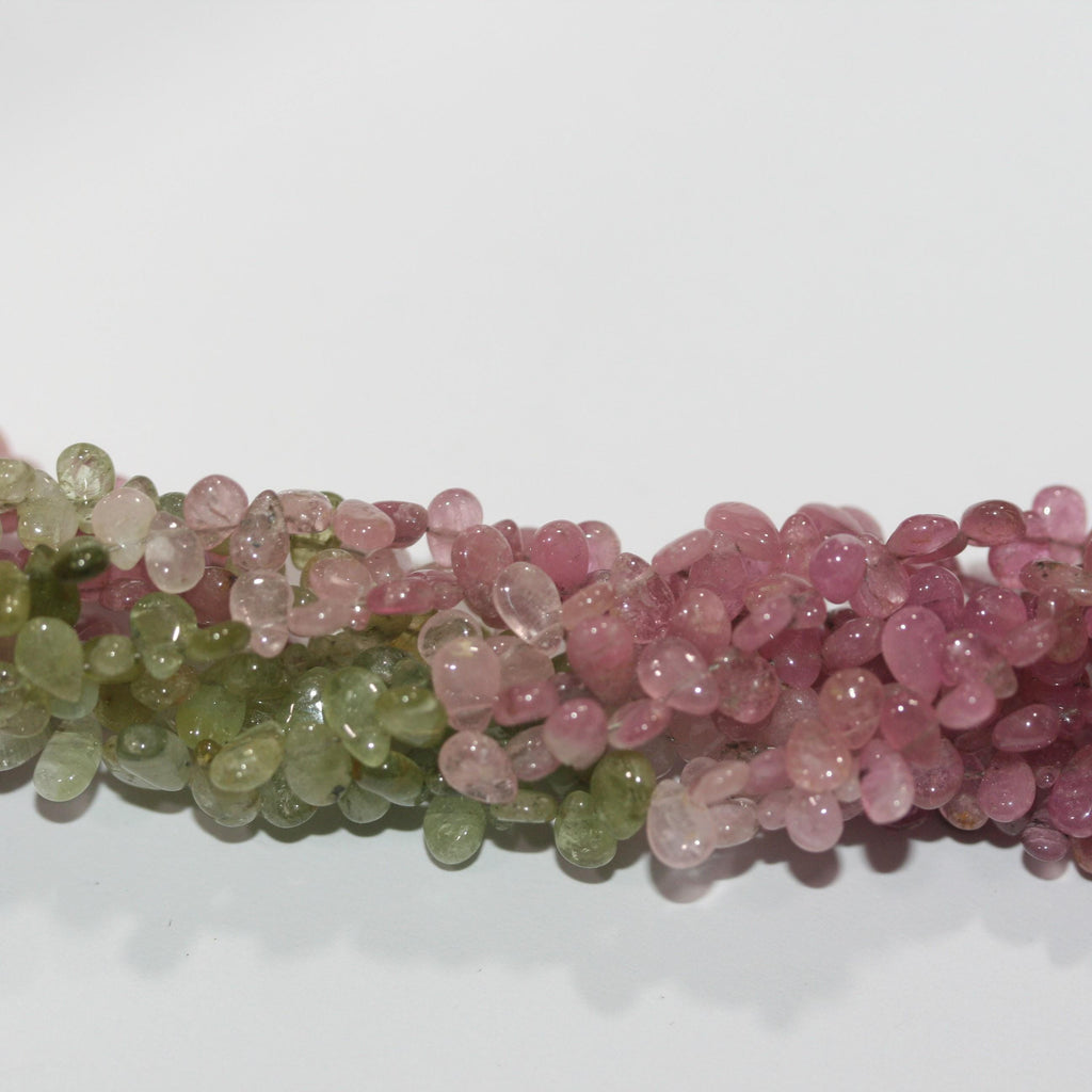 Perles en forme de goutte facettées en saphir rose-vert de 8 pouces (environ 5 x 4 mm) - Longueur du fil : 20 cm.
