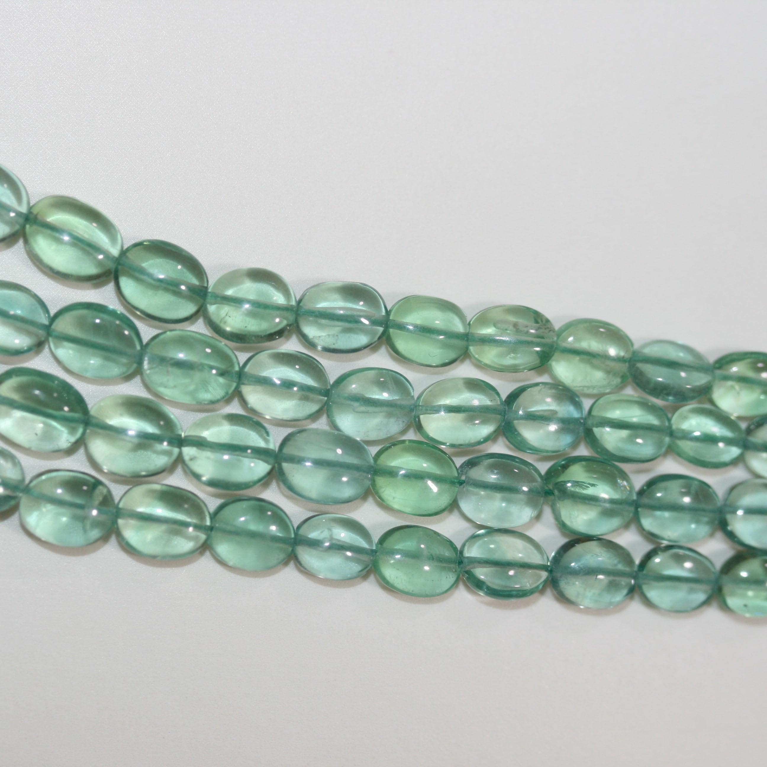 Collier ovale lisse dégradé en fluorite verte, 11 x 9 à 7 x 5 mm environ (4 rangs) - Réf. 15073