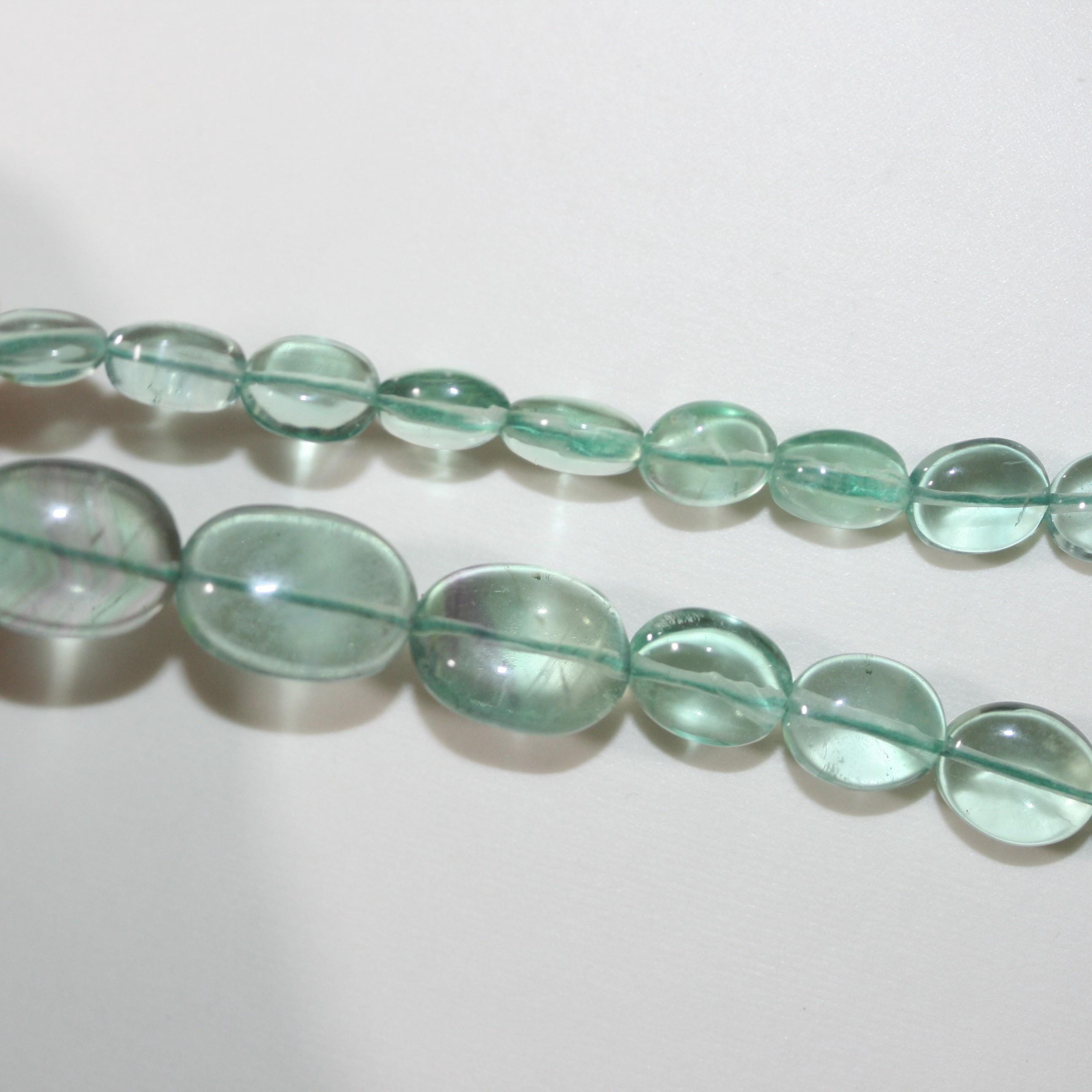 Collier ovale lisse dégradé en fluorite verte, 14 x 10 à 8 x 6 mm environ (3 rangs) - Réf. 15074