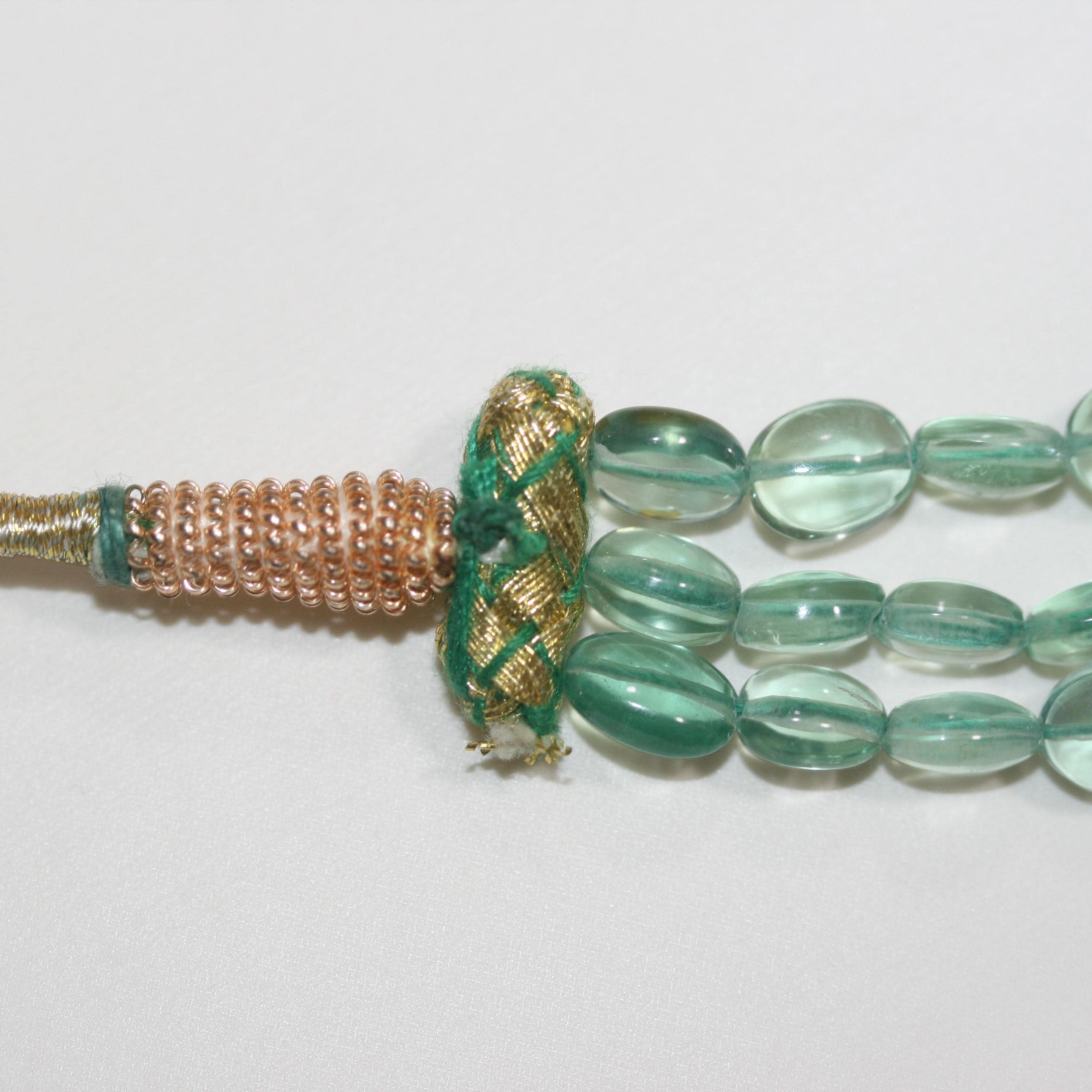 Collier ovale lisse dégradé en fluorite verte, 14 x 10 à 8 x 6 mm environ (3 rangs) - Réf. 15074