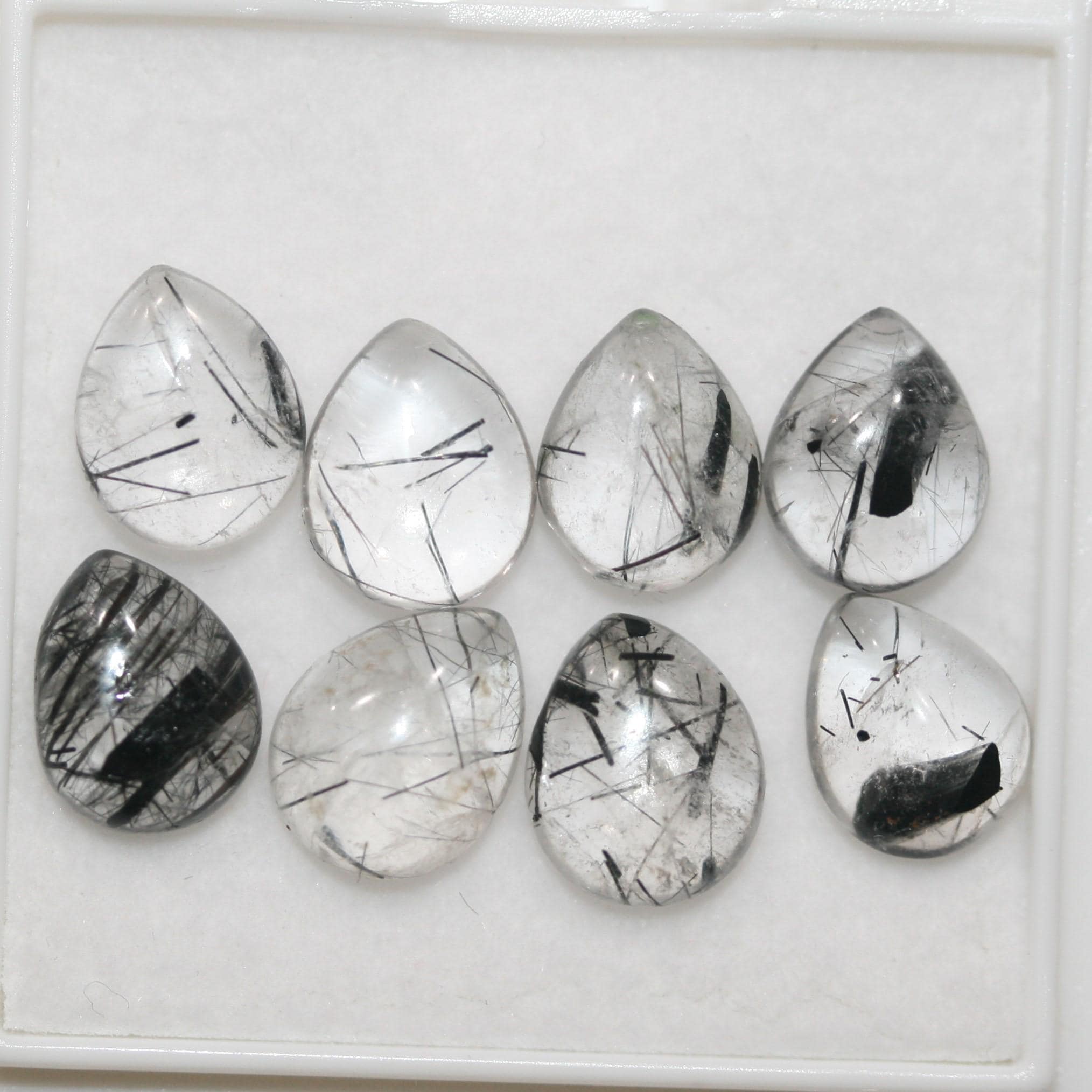 Lote de 8 cabujones lisos de cuarzo turmalinado de 10 x 8 mm (8 unidades). Artículo 1780CB