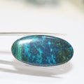 Cabochon ovale lisse en chrysocolle-shattuckite 40x20mm. (35,79 ct.)